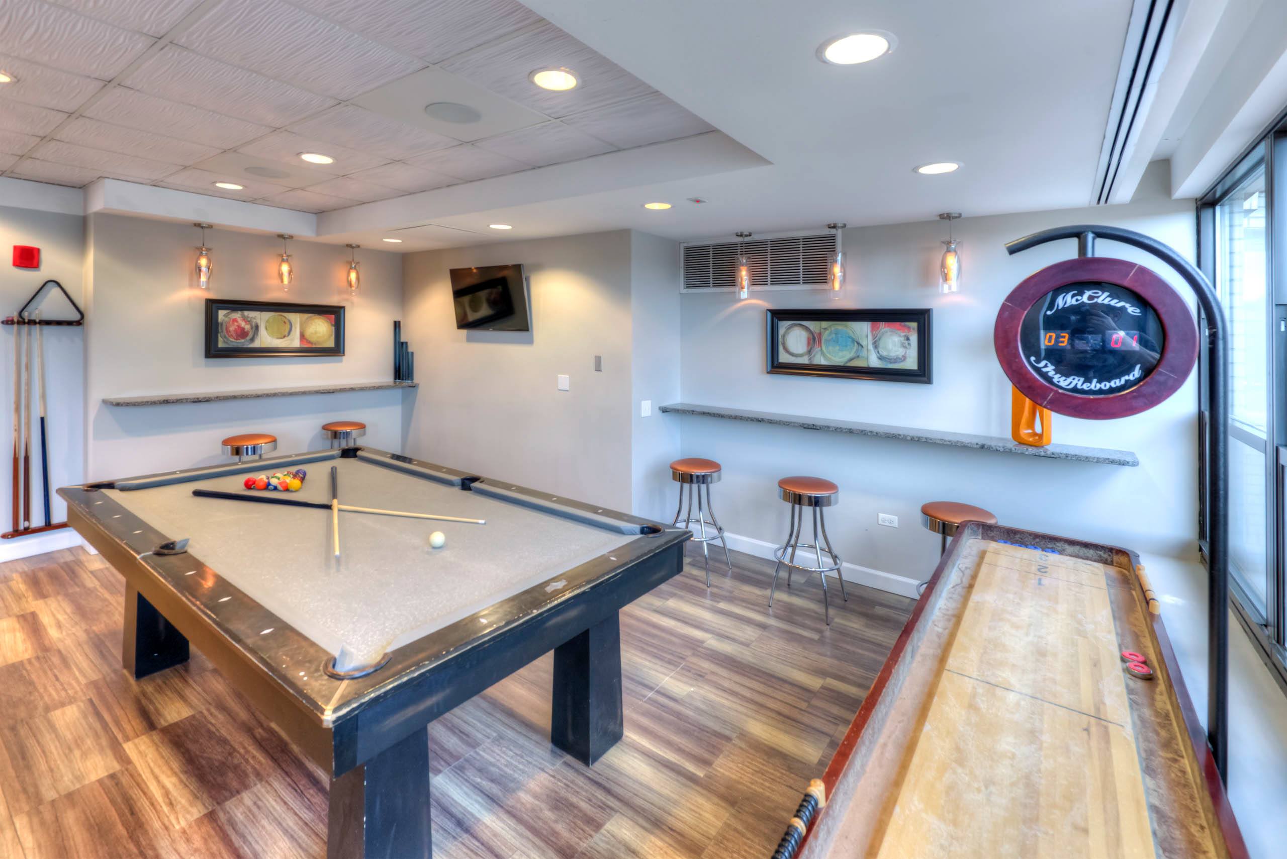 Game room with pool table and shuffleboard1 