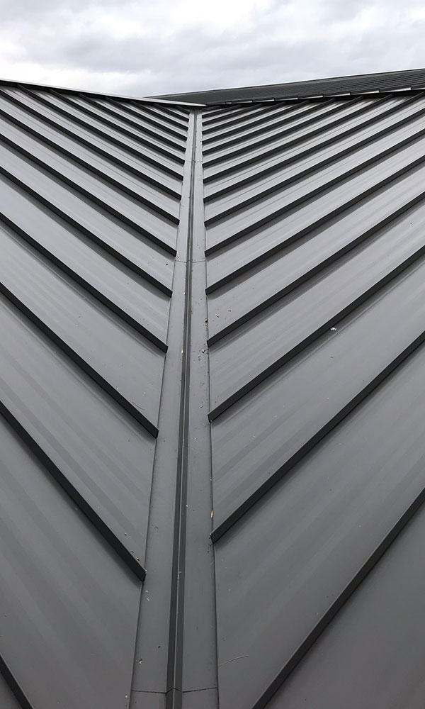 We manufacture our own standing seam roofing panels.