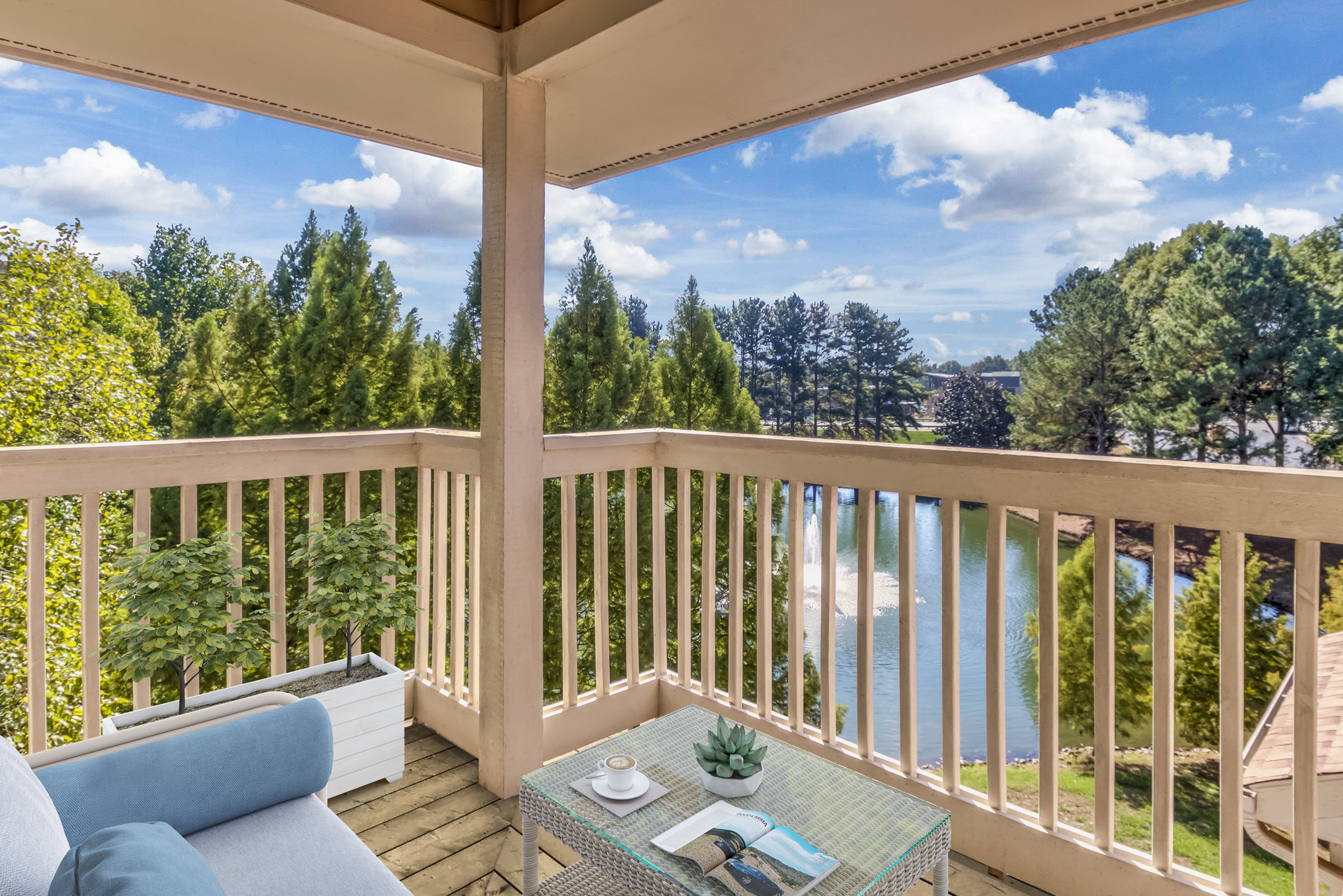 Private apartment balcony with views of community lake