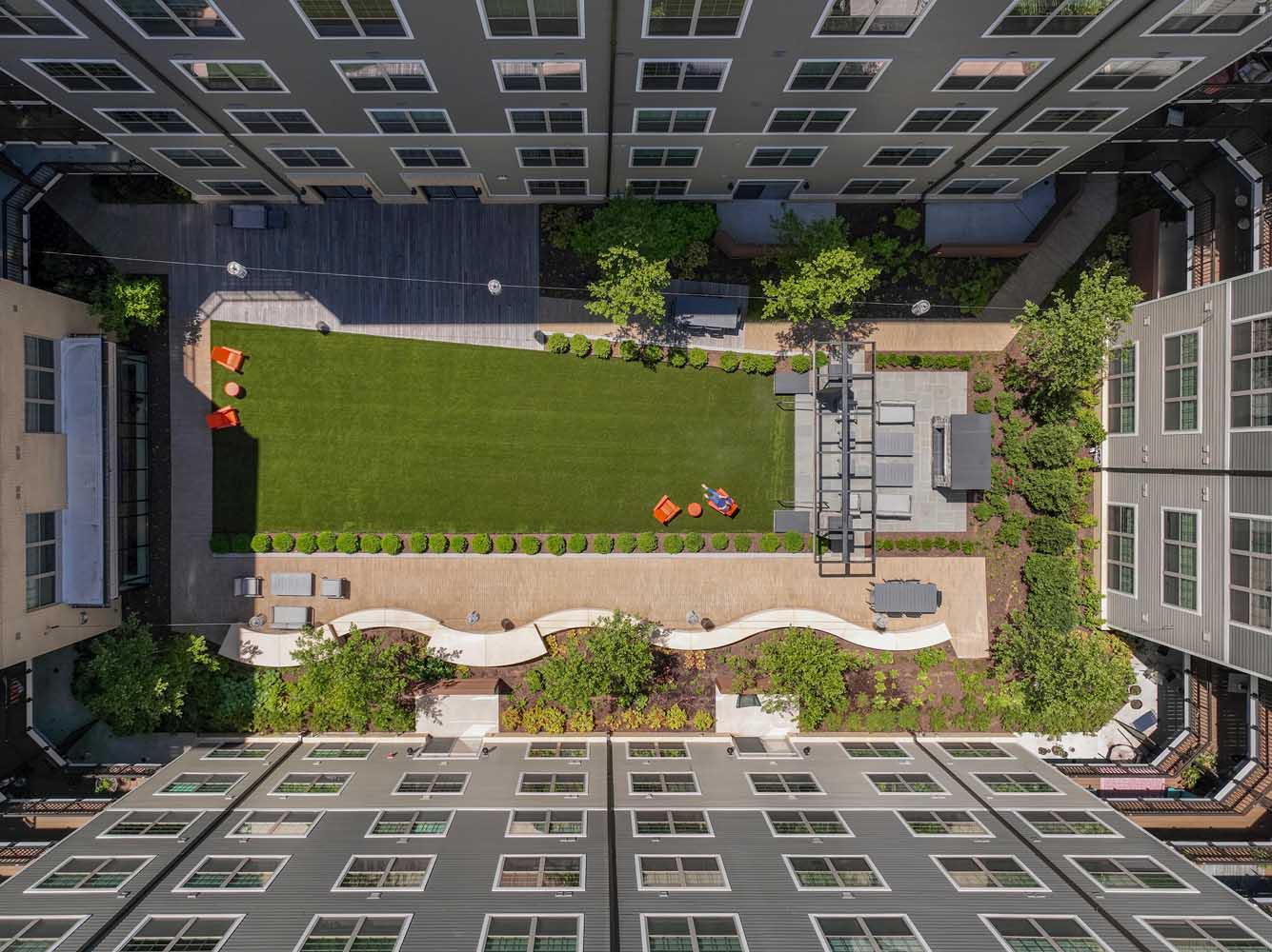 Secluded courtyard boasting a fireplace sun deck and copious amounts of seating