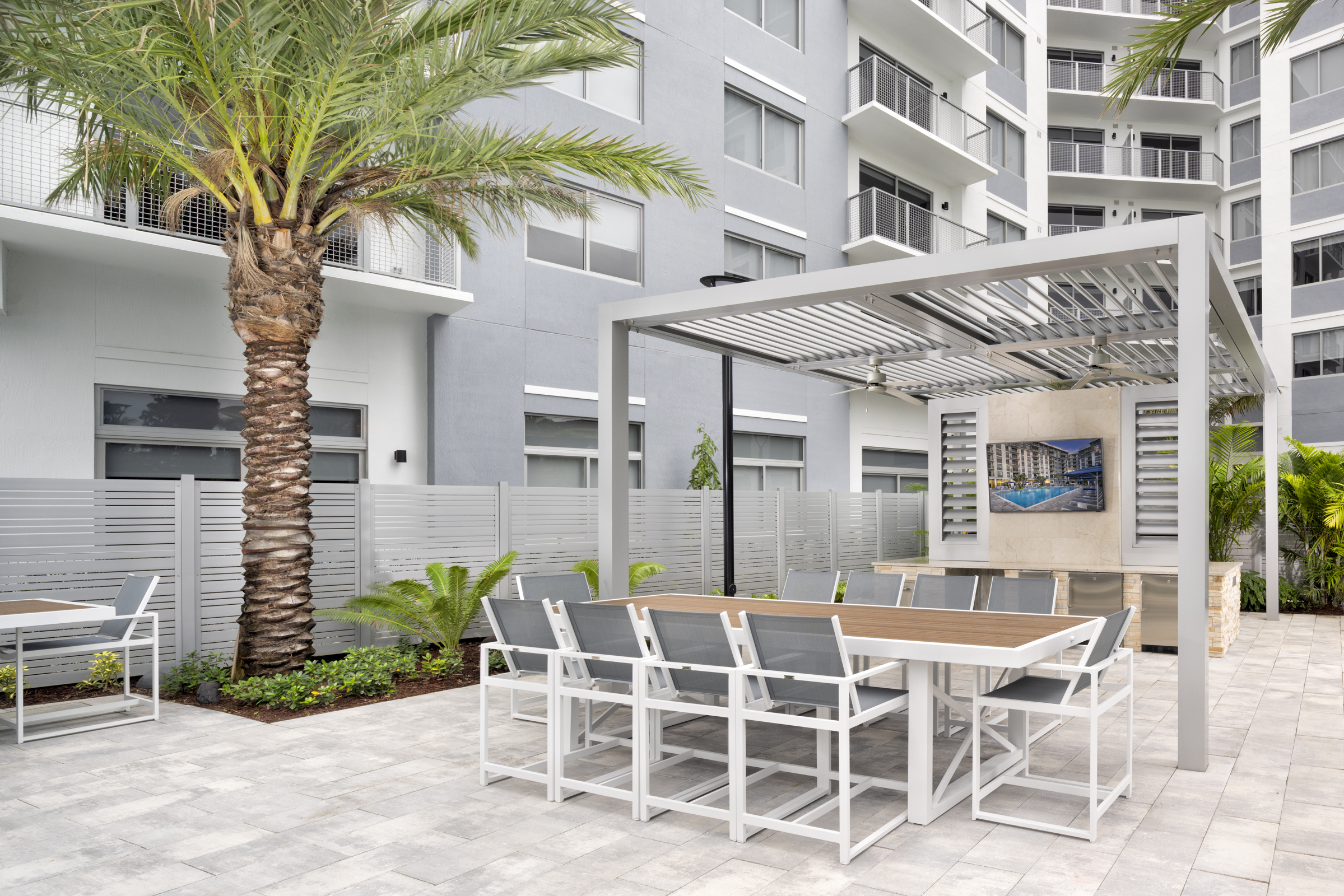 Summer Kitchen with BBQ Grills at The Marc Luxury Apartments in Palm Beach Gardens FL