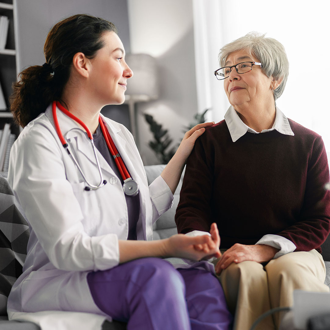 Physician with caregiver.