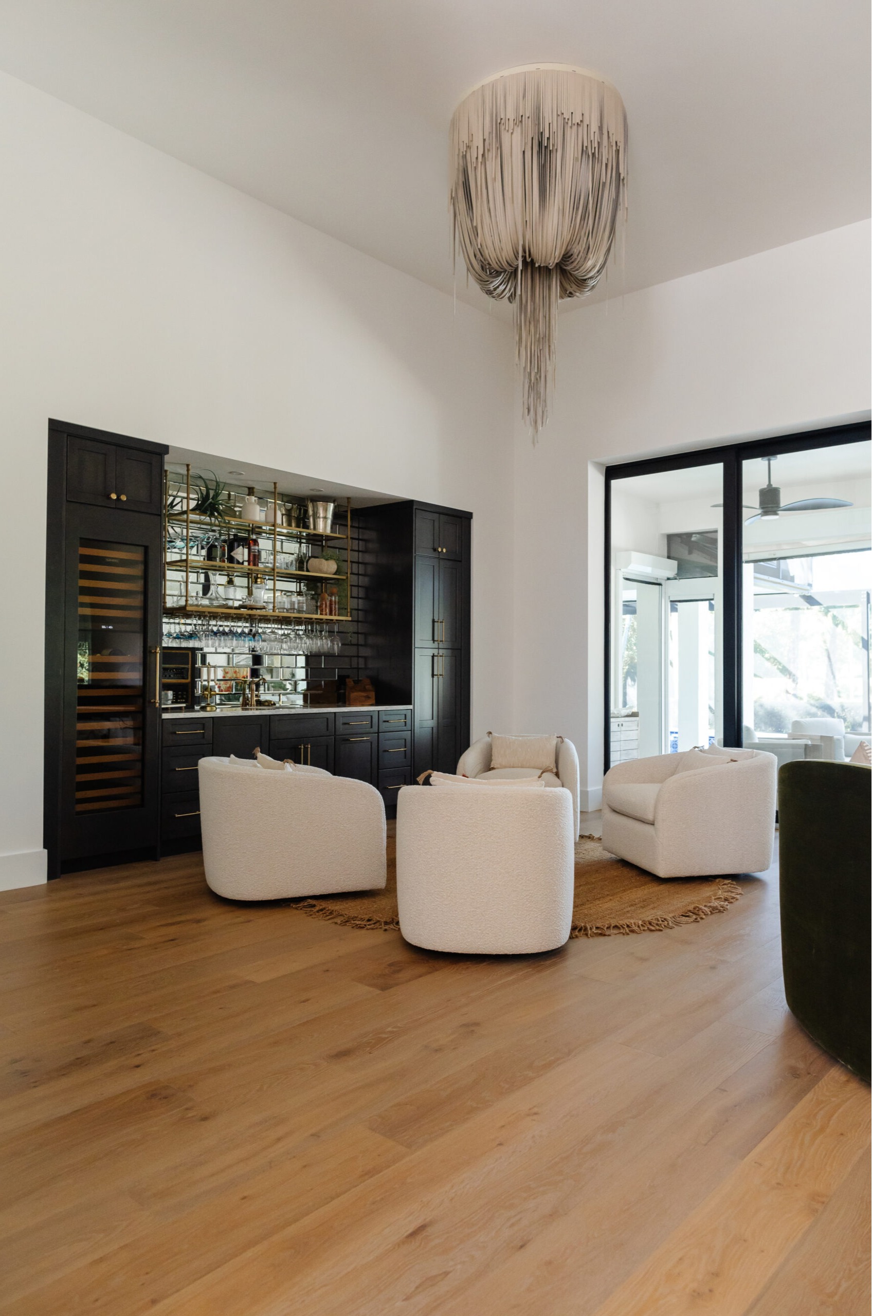 Whole home renovation with custom lighting and updated interior finishes by Coastal Pro Construction in Jensen Beach, FL
