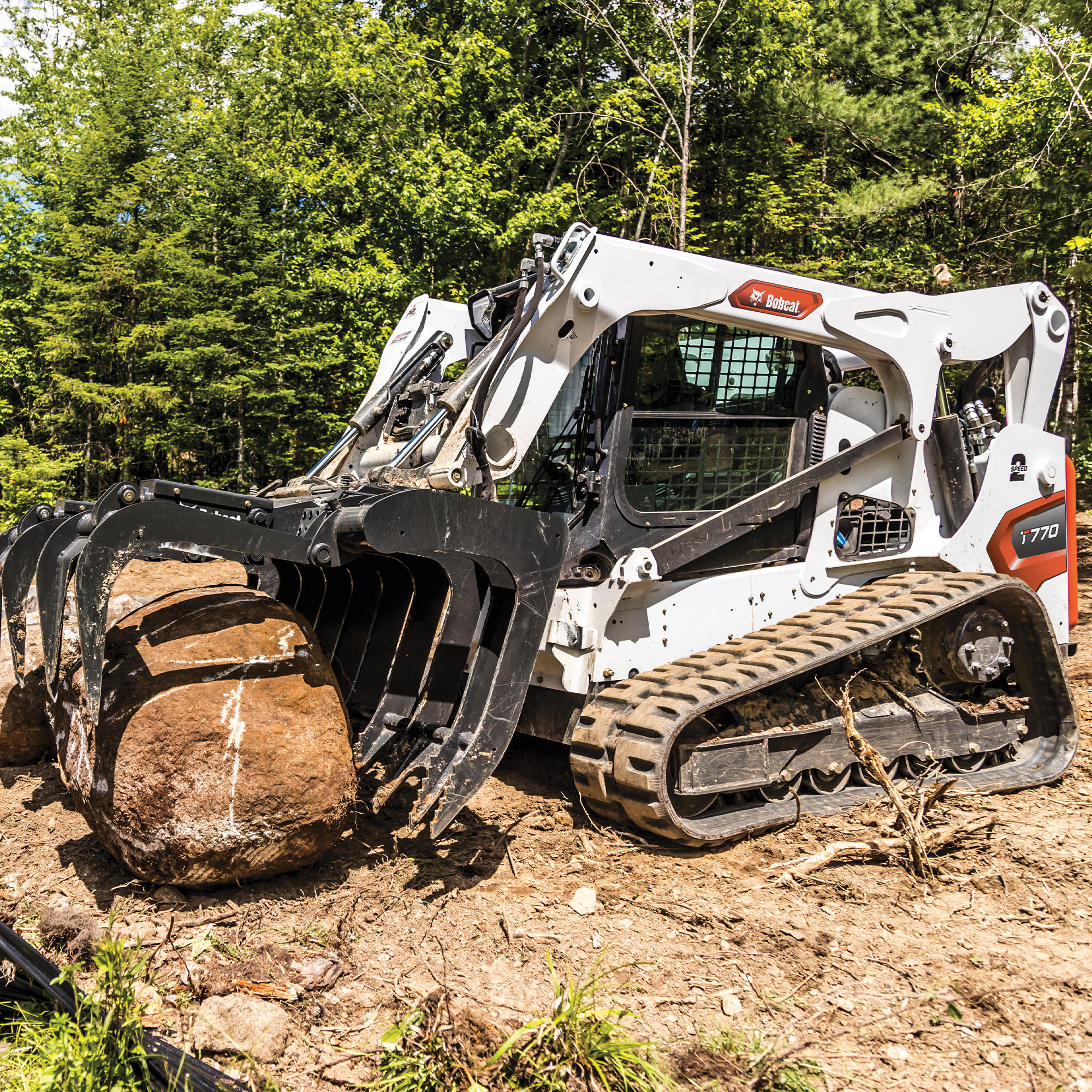 Bobcat T770 with root grapple attachment Paul Equipment Fredericton (506)449-3289