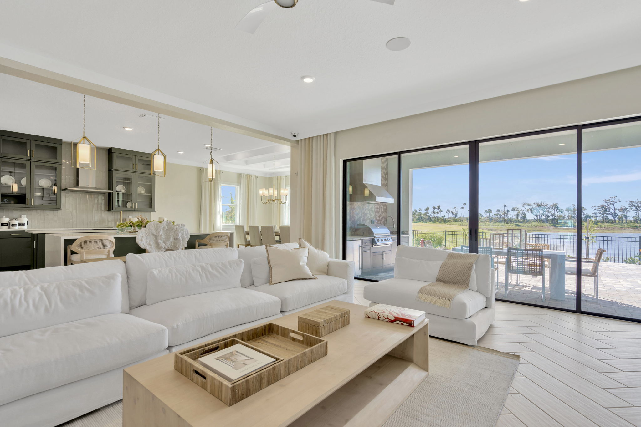 The Living Room of a DRB Homes Sabal Home Plan at Biscayne Landing at Seaire in Parrish, FL.