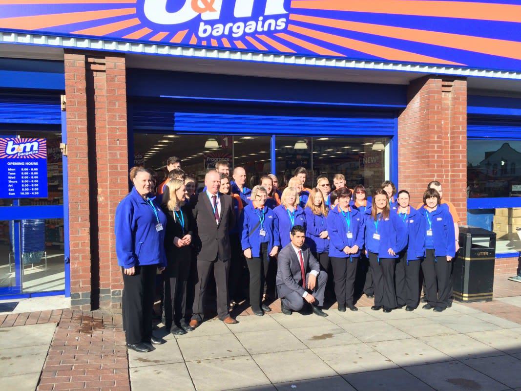 Store pose in front of their brand new B&M Bargains Store in Normanton