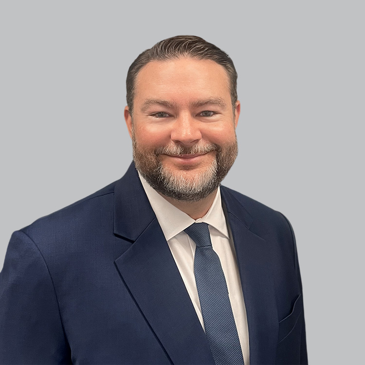 Headshot of Adam Davidson, a wealth advisor at Chase