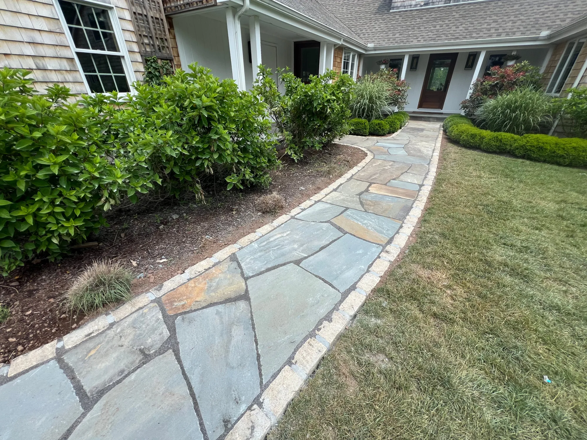 Front yard paver pathway - Walkways and pathways project by General Masonry LLC.