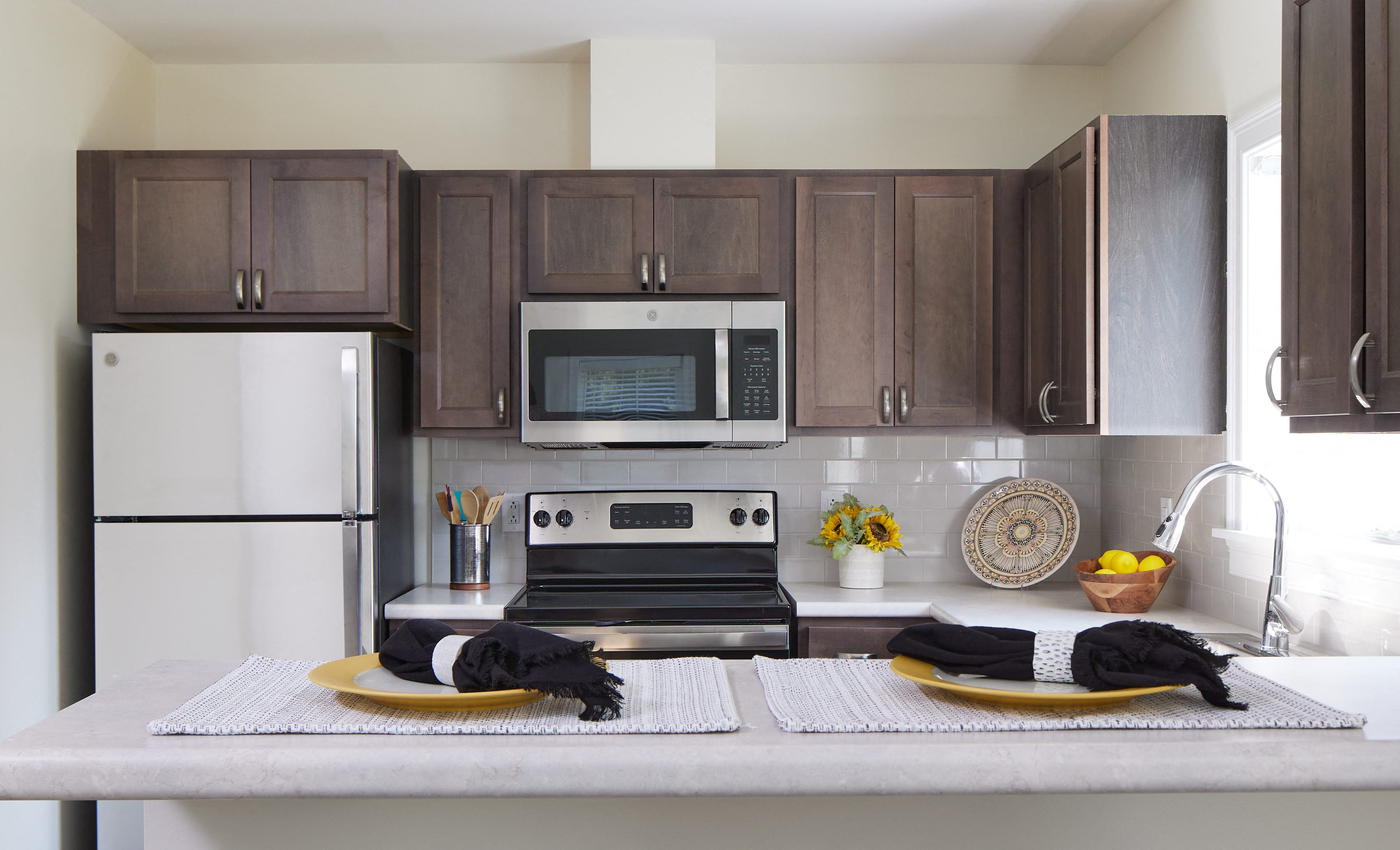 kitchen with stainless steel appliances and oak cabinets