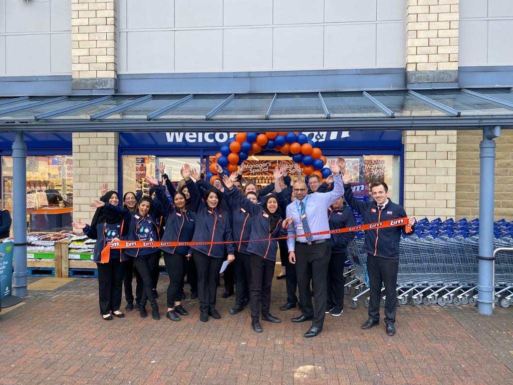 The store team at B&M's newest store in Bradford pose in front of their wonderful new Home Store & Garden Centre, located at Victoria Shopping Centre.