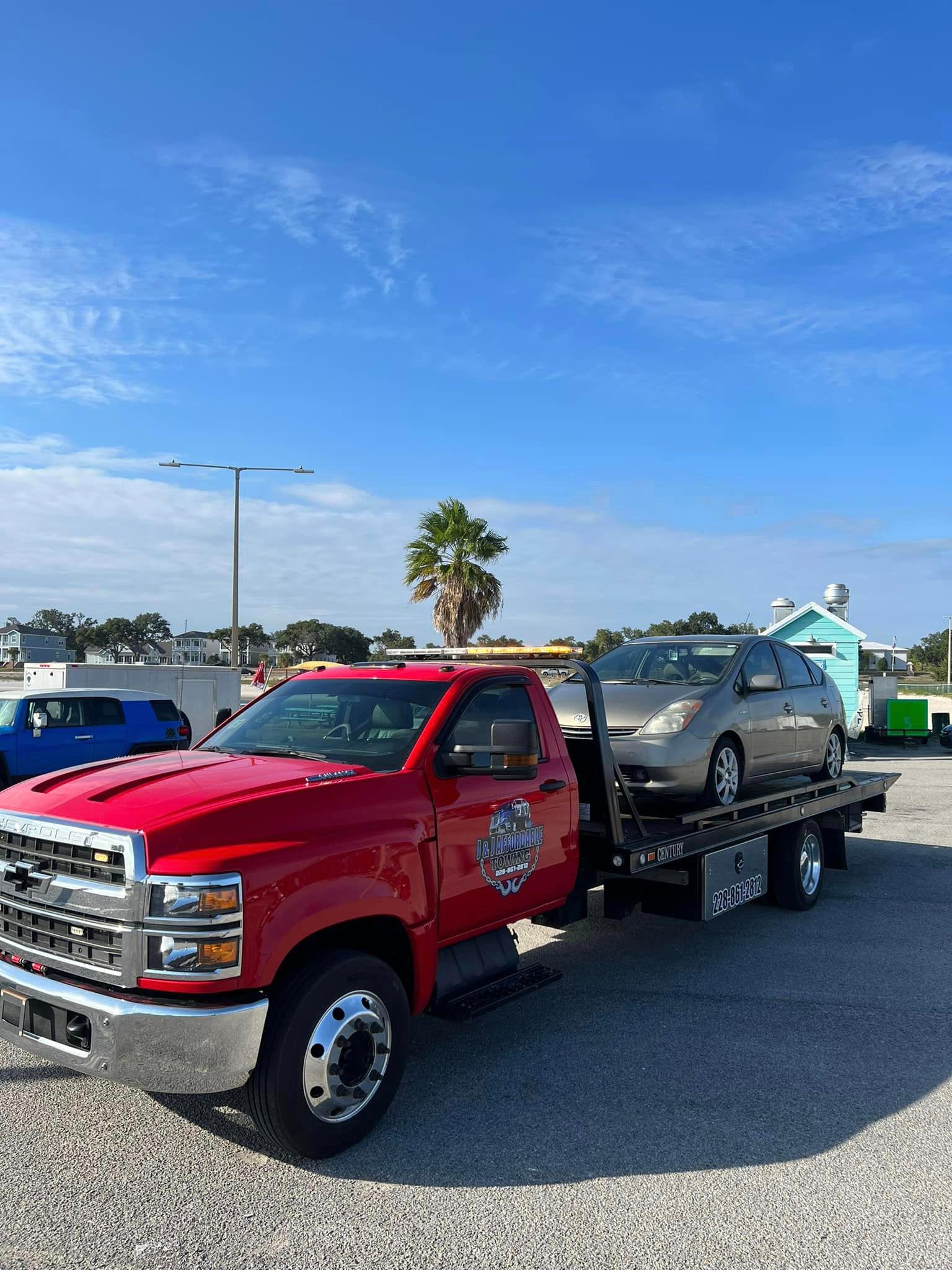 J&J Affordable Towing offers roll back tow truck services, designed to transport vehicles that cannot be towed conventionally. Our roll back tow trucks provide a flat and level platform, ensuring the safe and secure transportation of your vehicle, even if it's inoperable or damaged. Trust us to handle your vehicle with care and precision when you need a roll back tow.