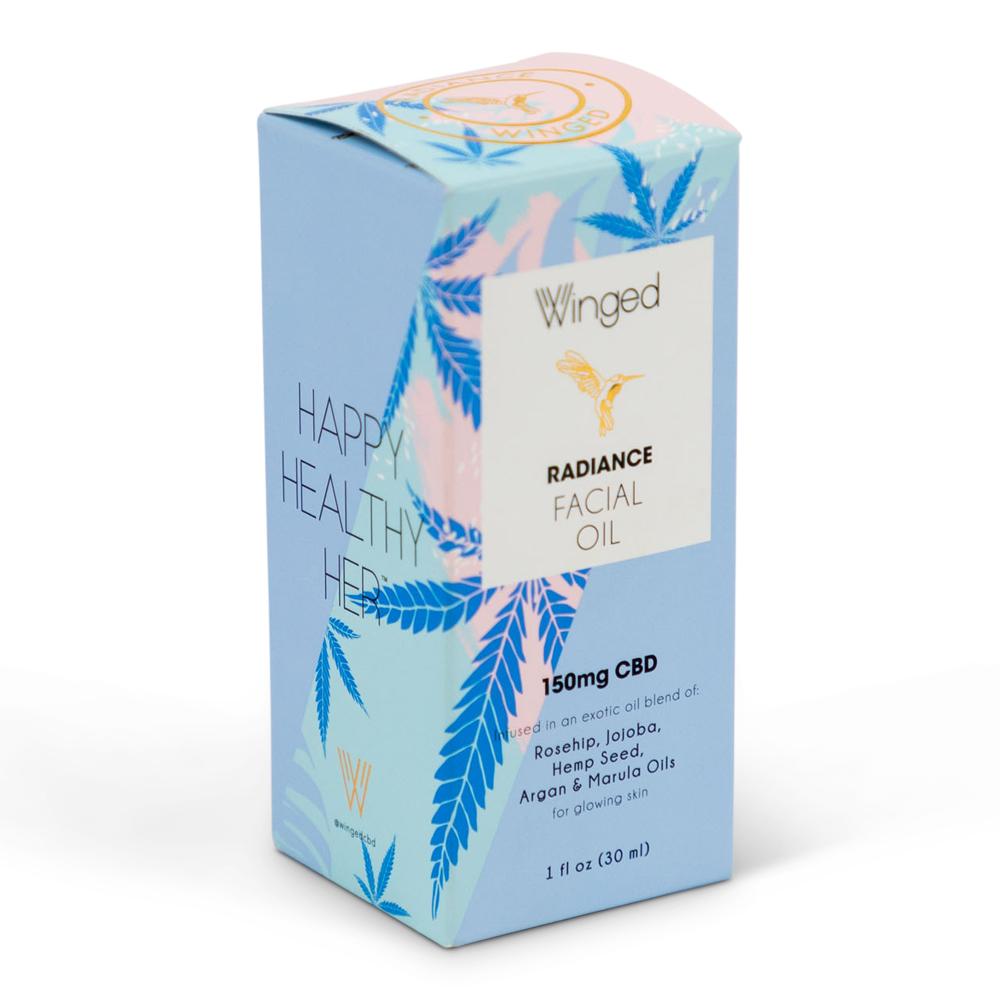 Tuck box for Winged CBD facial oil. Custom packaging by PLC Print.