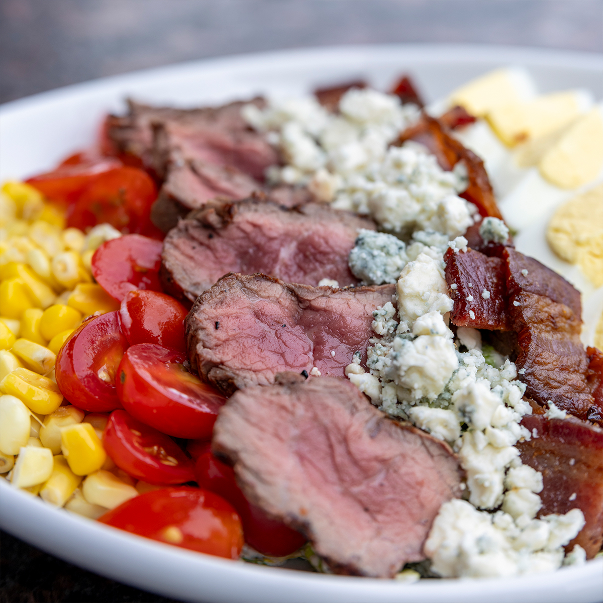 Filet Mignon Cobb Salad | bacon, egg, blue cheese crumble, corn, tomato, smoked onion ranch