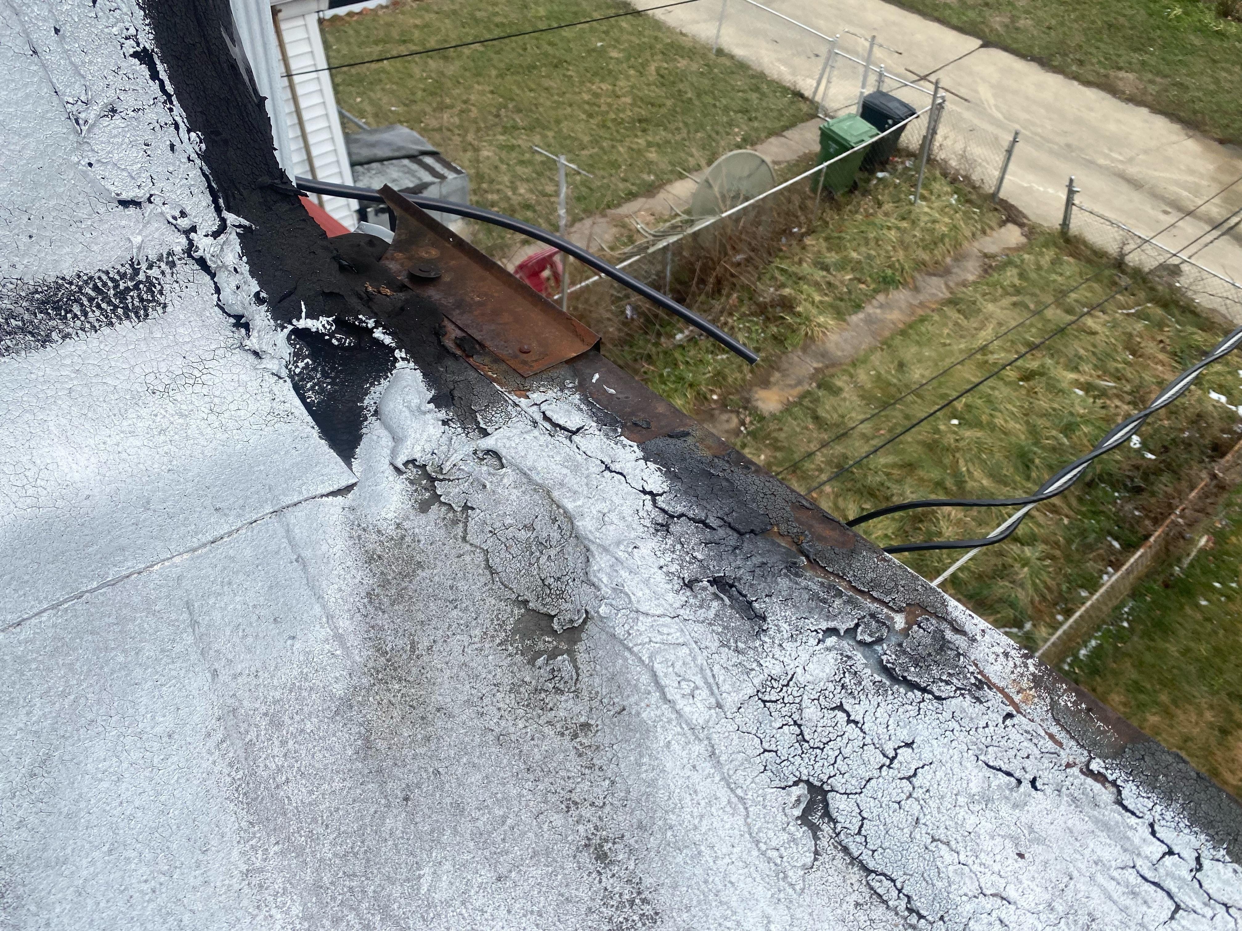 Flat roof damage allowing water to get inside causing leaks