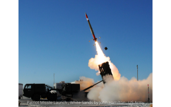 Patriot missile launch at White Sands demonstrating defense applications of DSI's advanced optical coatings. The company's IsoDyn® LPCVD technology coats ceramic, sapphire, and zinc sulfide missile domes (as small as 0.25 mm diameter) providing antireflection properties, environmental durability, and laser damage resistance for guidance systems and FLIR optics in military defense applications.