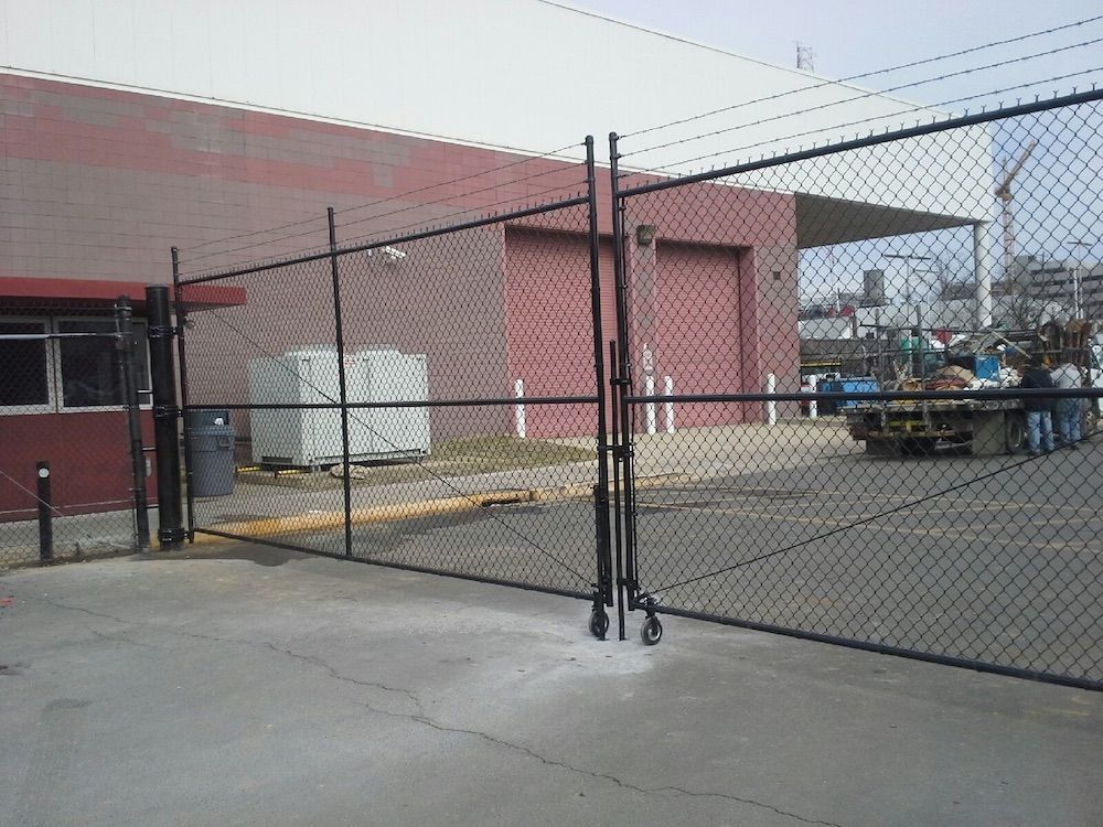 chain link fence with barbed wire Beitzell Fence Co. Gainesville (703)691-5891