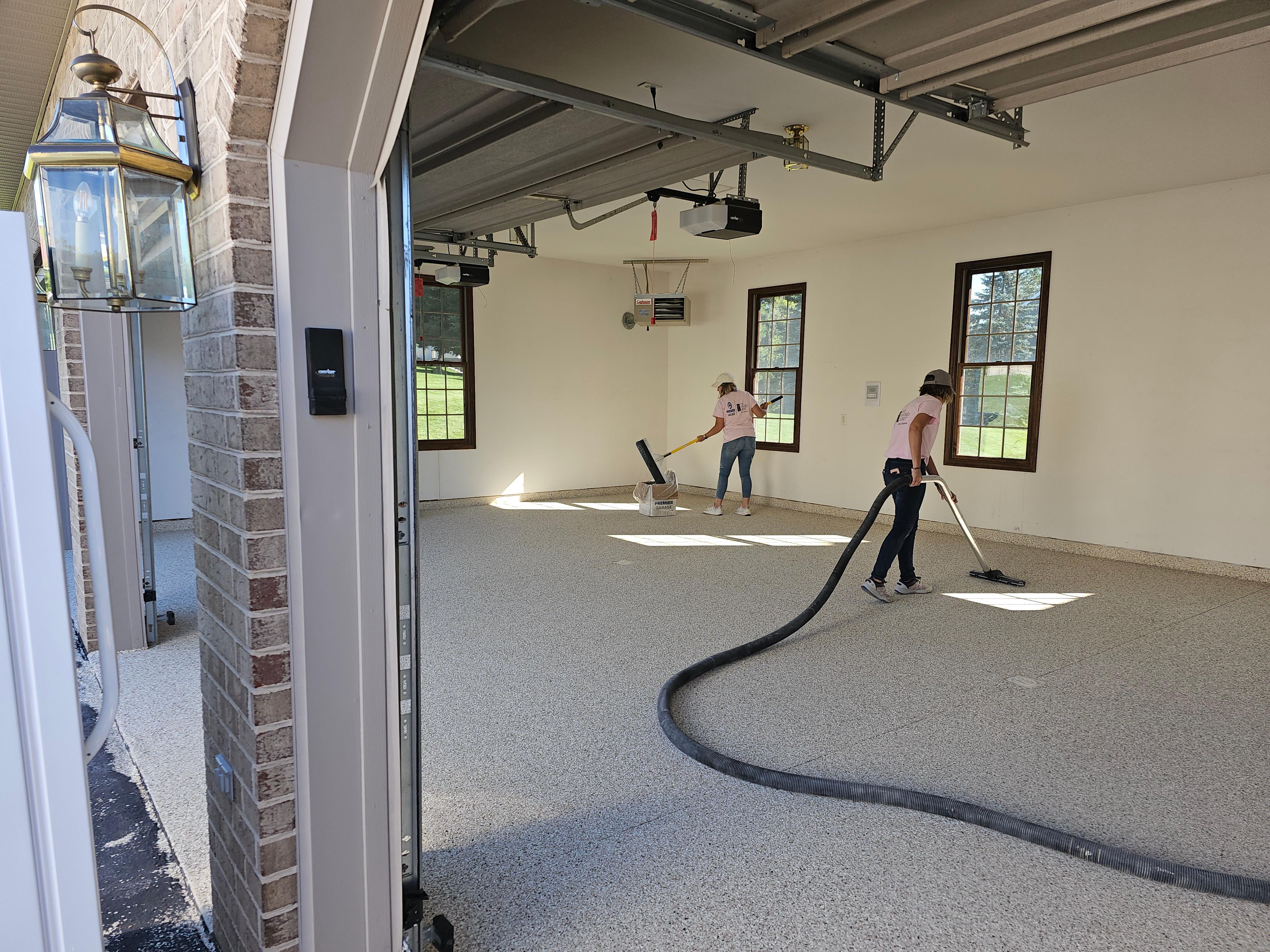 The ladies are getting this floor prepped for the polyaspartic top coat on this beautiful High Performance Commercial grade epoxy floor with Iced Coffee flake in Williamsport!