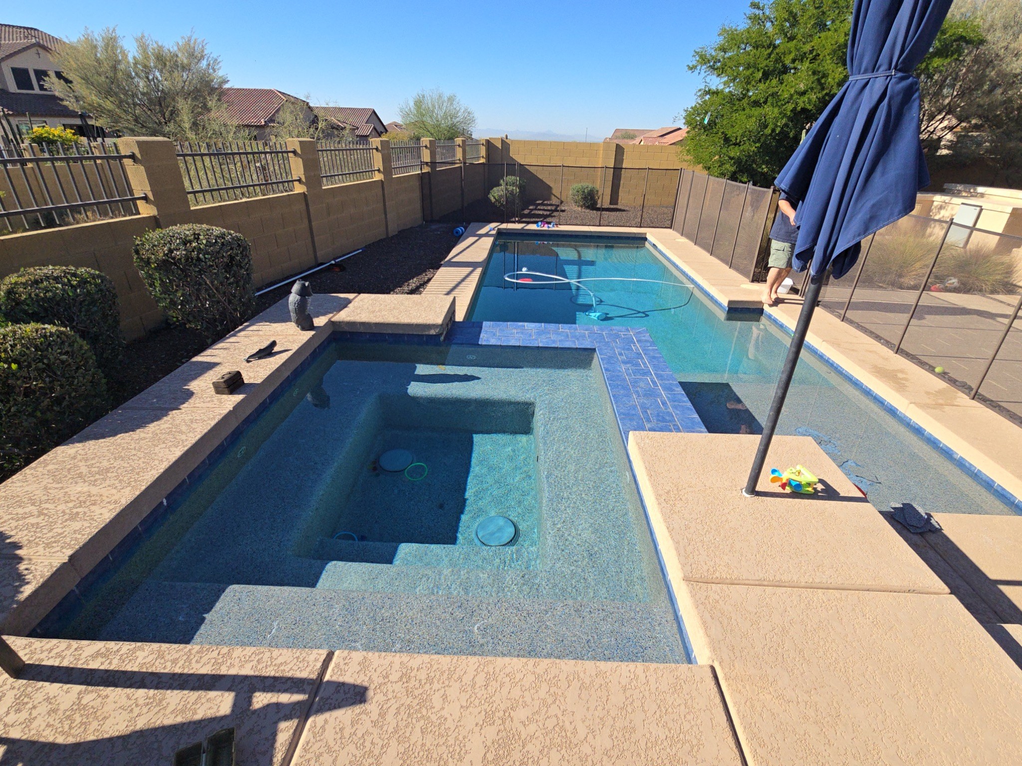 An existing pool can be redesigned to improve how homeowners use their outdoor space. This pool incl 
