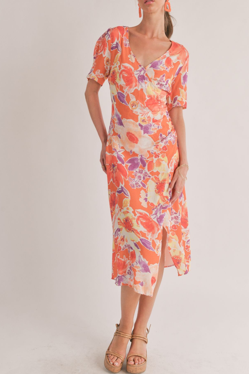 SHORT SLEEVE V NECK MIDI FAUX WRAP MIDI DRESS WITH SIDE BUTTON DETAIL AND SIDE SLIT AVAILABLE IN A RED FLORAL PATTERN