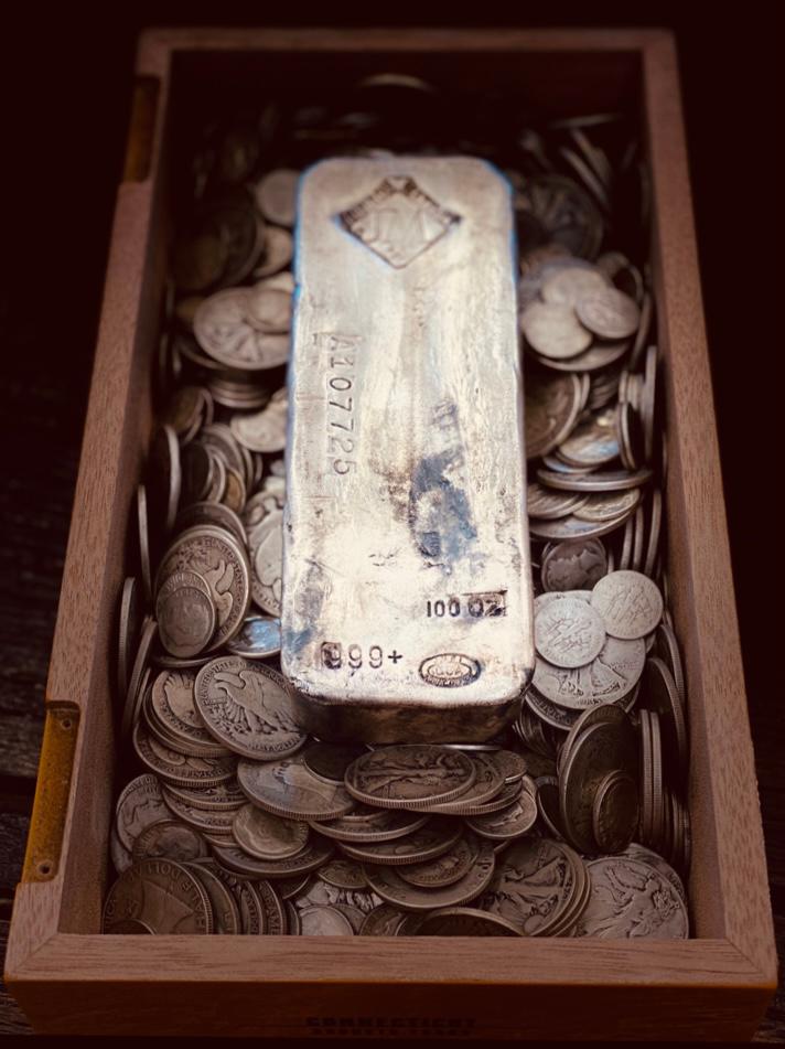 100 oz JM Silver Bar on a lot of 90% Junk coinage.