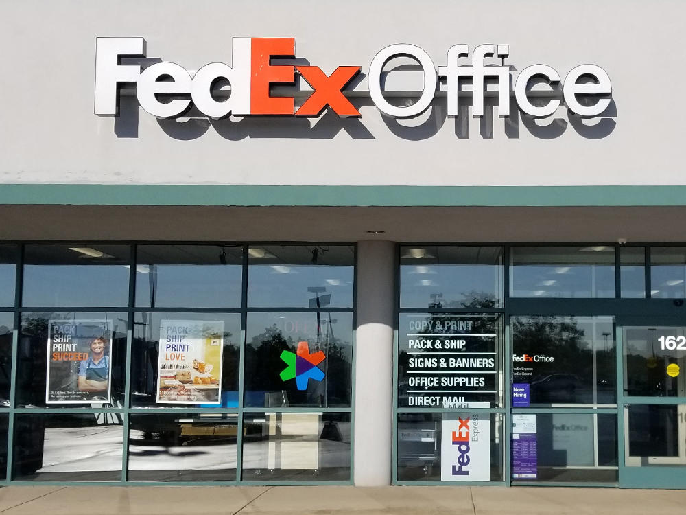 Exterior photo of FedEx Office location at 162 Biesterfield Rd\t Print quickly and easily in the self-service area at the FedEx Office location 162 Biesterfield Rd from email, USB, or the cloud\t FedEx Office Print & Go near 162 Biesterfield Rd\t Shipping boxes and packing services available at FedEx Office 162 Biesterfield Rd\t Get banners, signs, posters and prints at FedEx Office 162 Biesterfield Rd\t Full service printing and packing at FedEx Office 162 Biesterfield Rd\t Drop off FedEx packages near 162 Biesterfield Rd\t FedEx shipping near 162 Biesterfield Rd