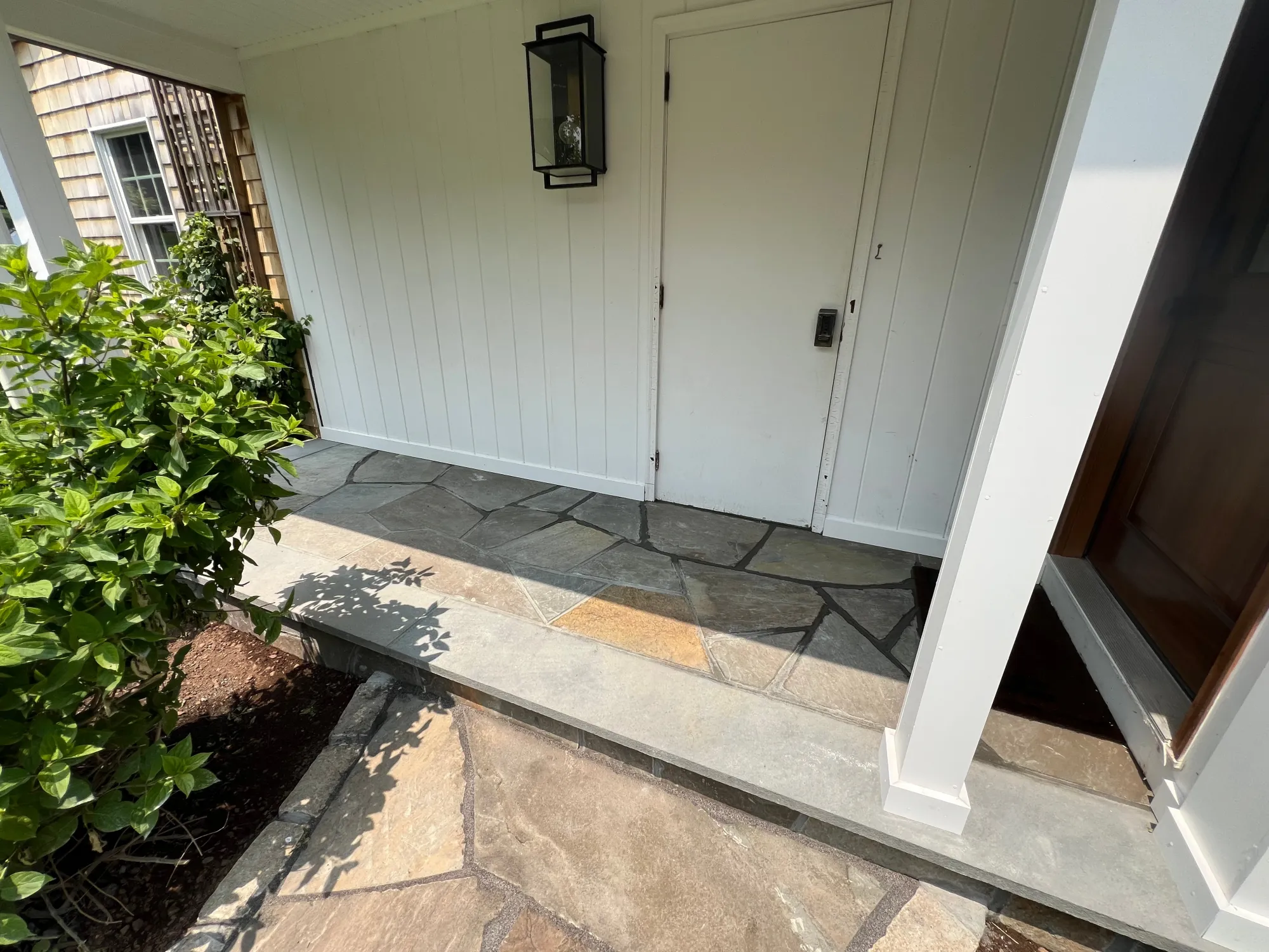 Bluestone walkway leading to the entrance in West Hartford - Bluestone Walkway, West Hartford project by General Masonry LLC.