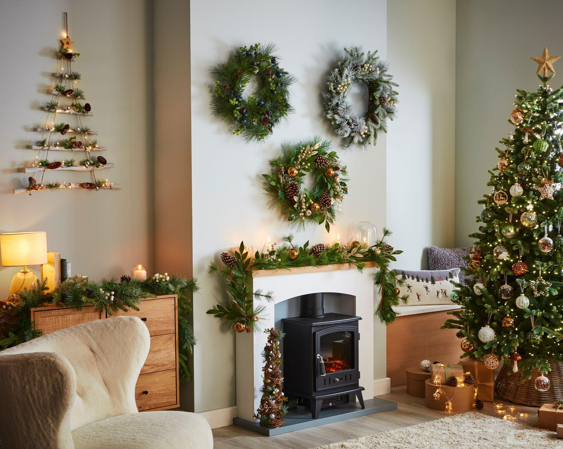 A living room adorned with Christmas decorations including wreaths & garlands