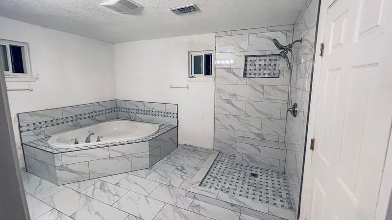 Images Alamo City Flooring & Bath