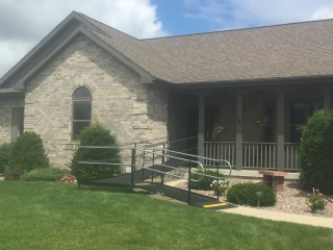Amramp Southeastern Wisconsin provided access to the front entrance of this Prarie Du Sac home with an Amramp modular wheelchair ramp.
