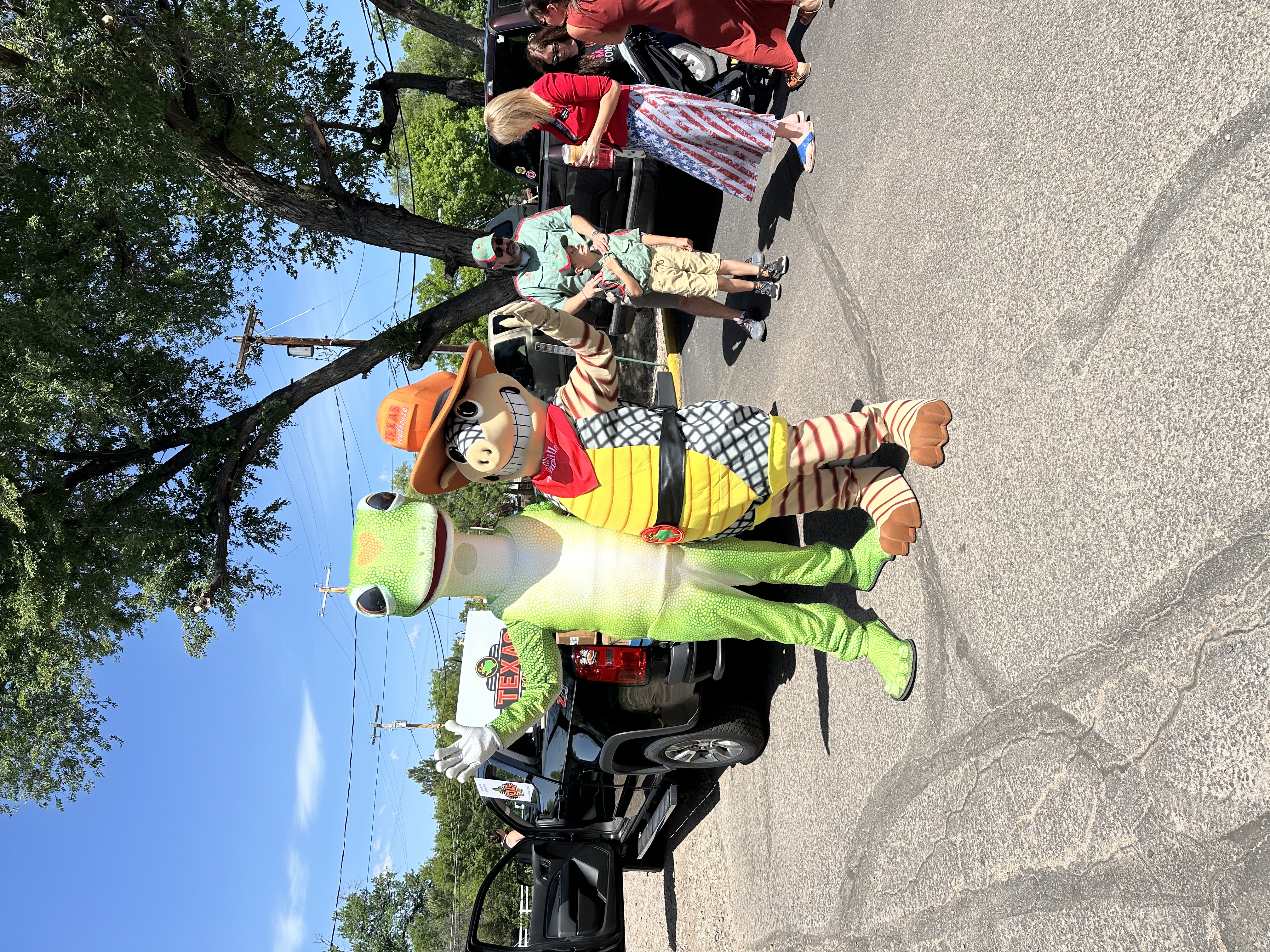 Arvada Memorial Day parade with the Texas Roadhouse mascot