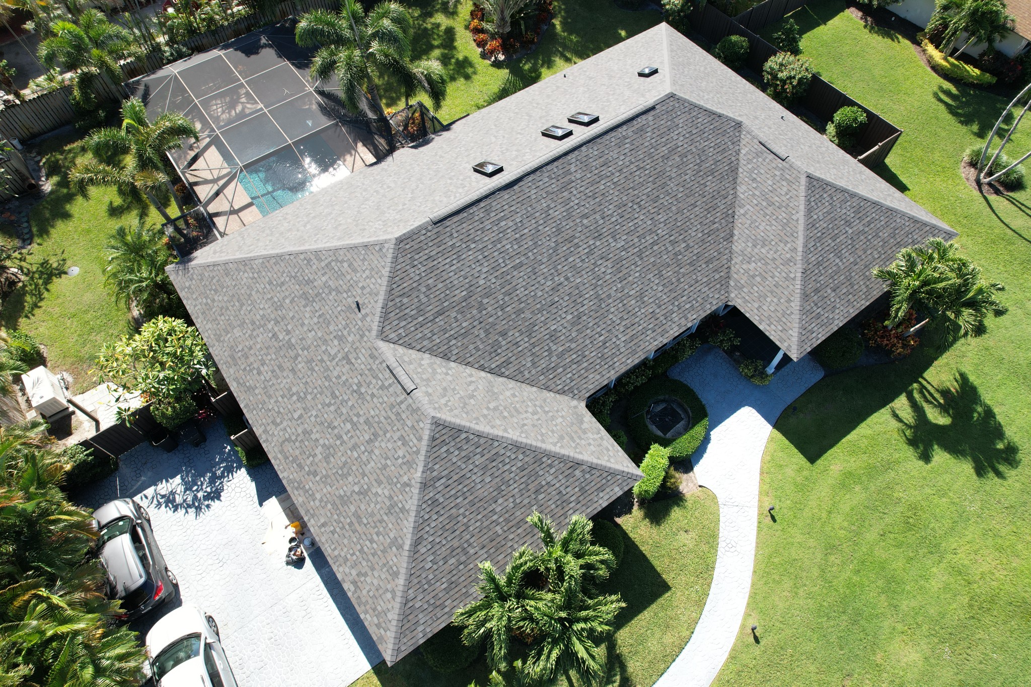 We replaced this roof and installed shingles from Owens Corning. This shingle color is Williamsburg Gray.