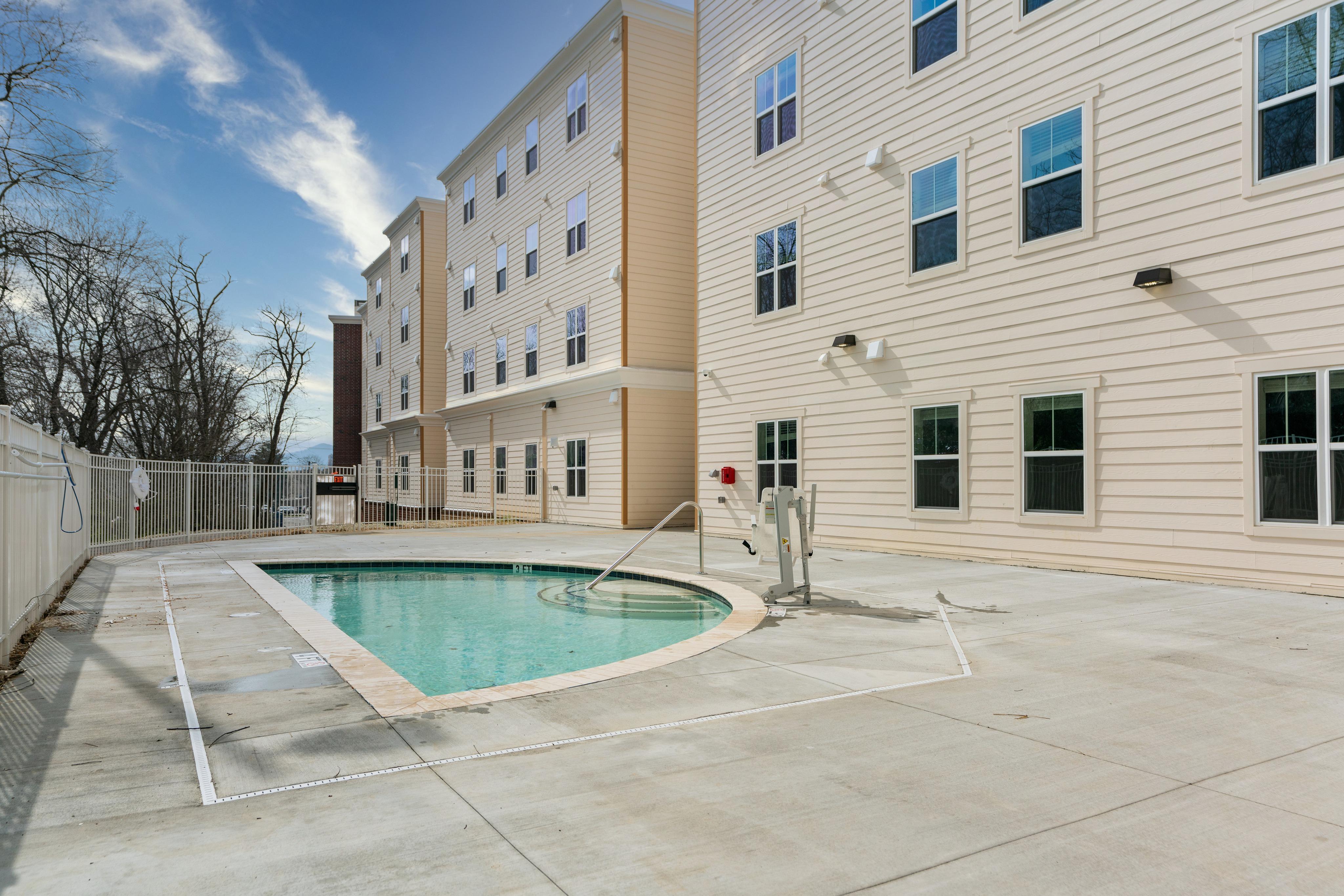 Half moon pool with expansive sundeck