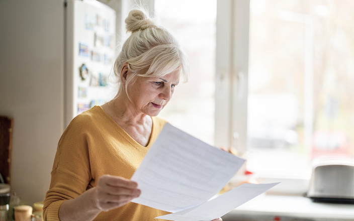 A business owner reviewing documents.
