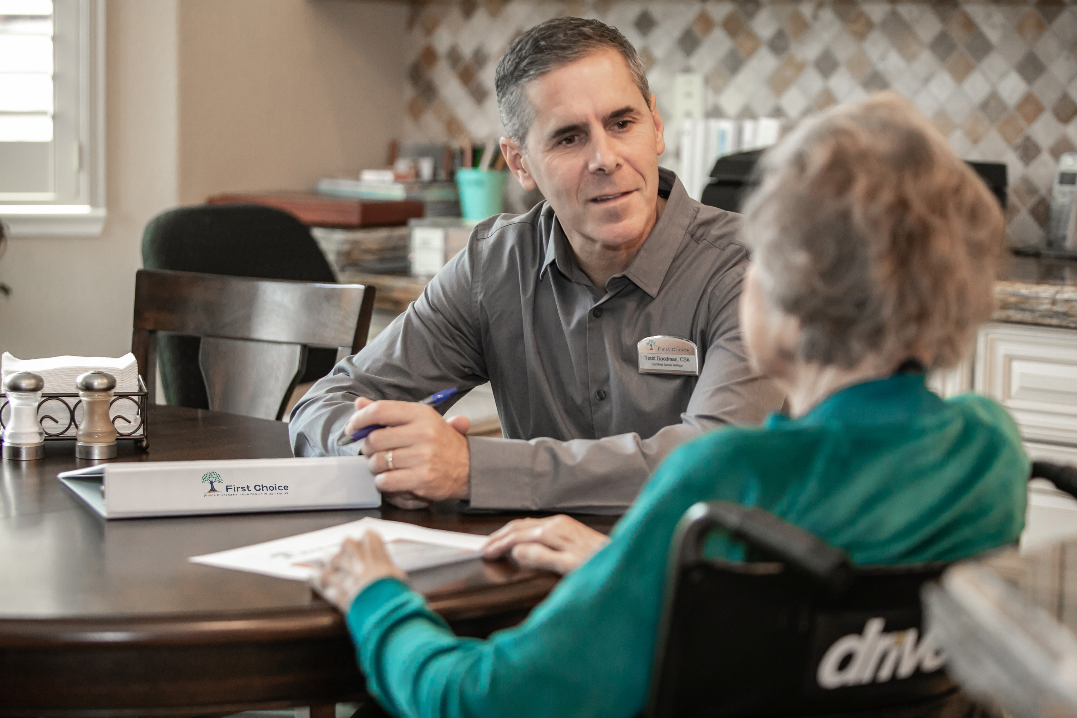 Todd Goodman, Certified Senior Advisor visiting a senior woman in need of placement in an assisted living facility