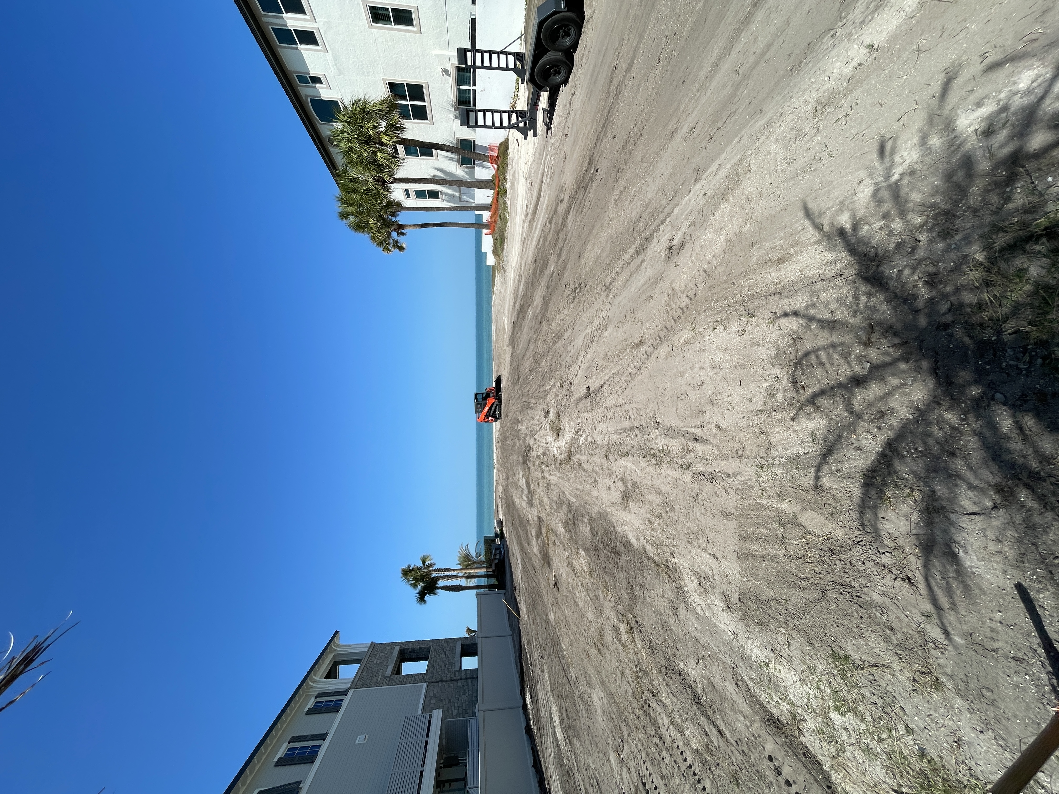 Pre-construction lot cleaning and grading.