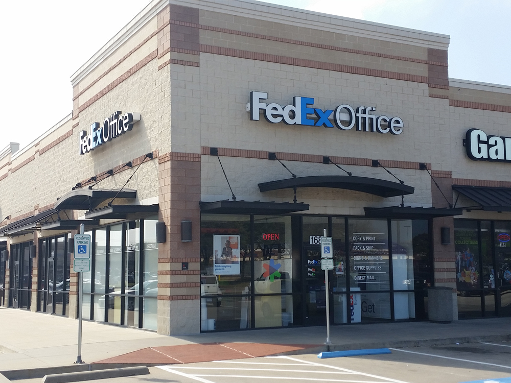 Exterior photo of FedEx Office location at 1301 W Glade Rd\t Print quickly and easily in the self-service area at the FedEx Office location 1301 W Glade Rd from email, USB, or the cloud\t FedEx Office Print & Go near 1301 W Glade Rd\t Shipping boxes and packing services available at FedEx Office 1301 W Glade Rd\t Get banners, signs, posters and prints at FedEx Office 1301 W Glade Rd\t Full service printing and packing at FedEx Office 1301 W Glade Rd\t Drop off FedEx packages near 1301 W Glade Rd\t FedEx shipping near 1301 W Glade Rd