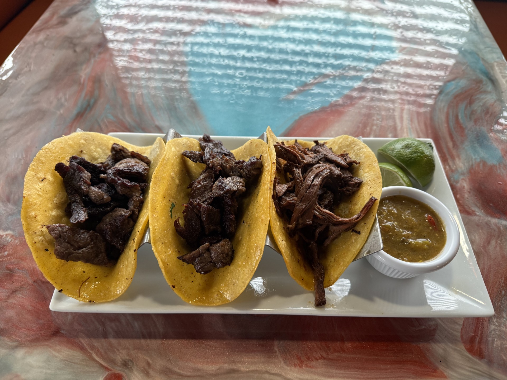 Pick Three Tacos platter served at Catramex Restaurant featuring authentic Mexican street-style tacos with fresh ingredients, bold flavors, and traditional toppings in Southern Maine.