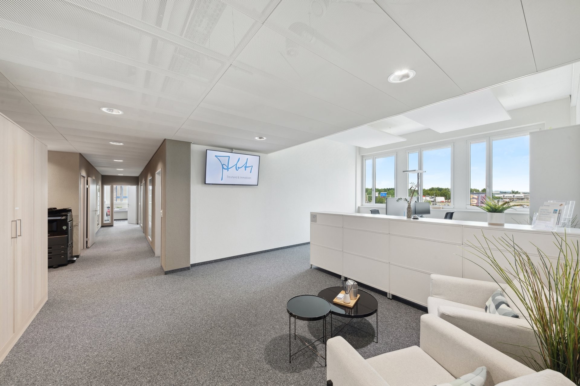Bilder Treuhand & Immobilien Abt AG
