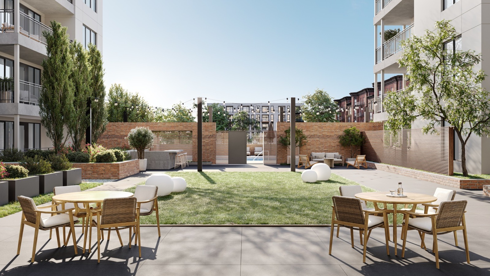 outdoor courtyard with green lawn | Juliette