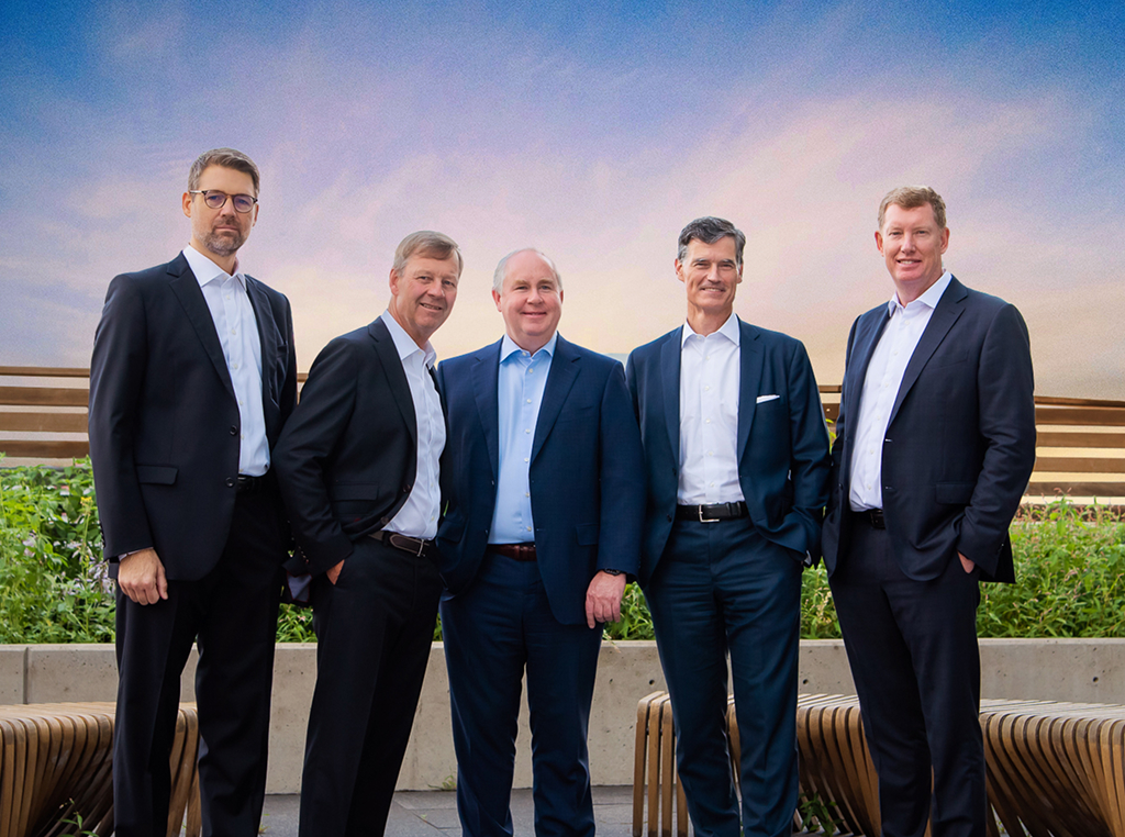 The key decision makers of The Harbour Group standing side by side.