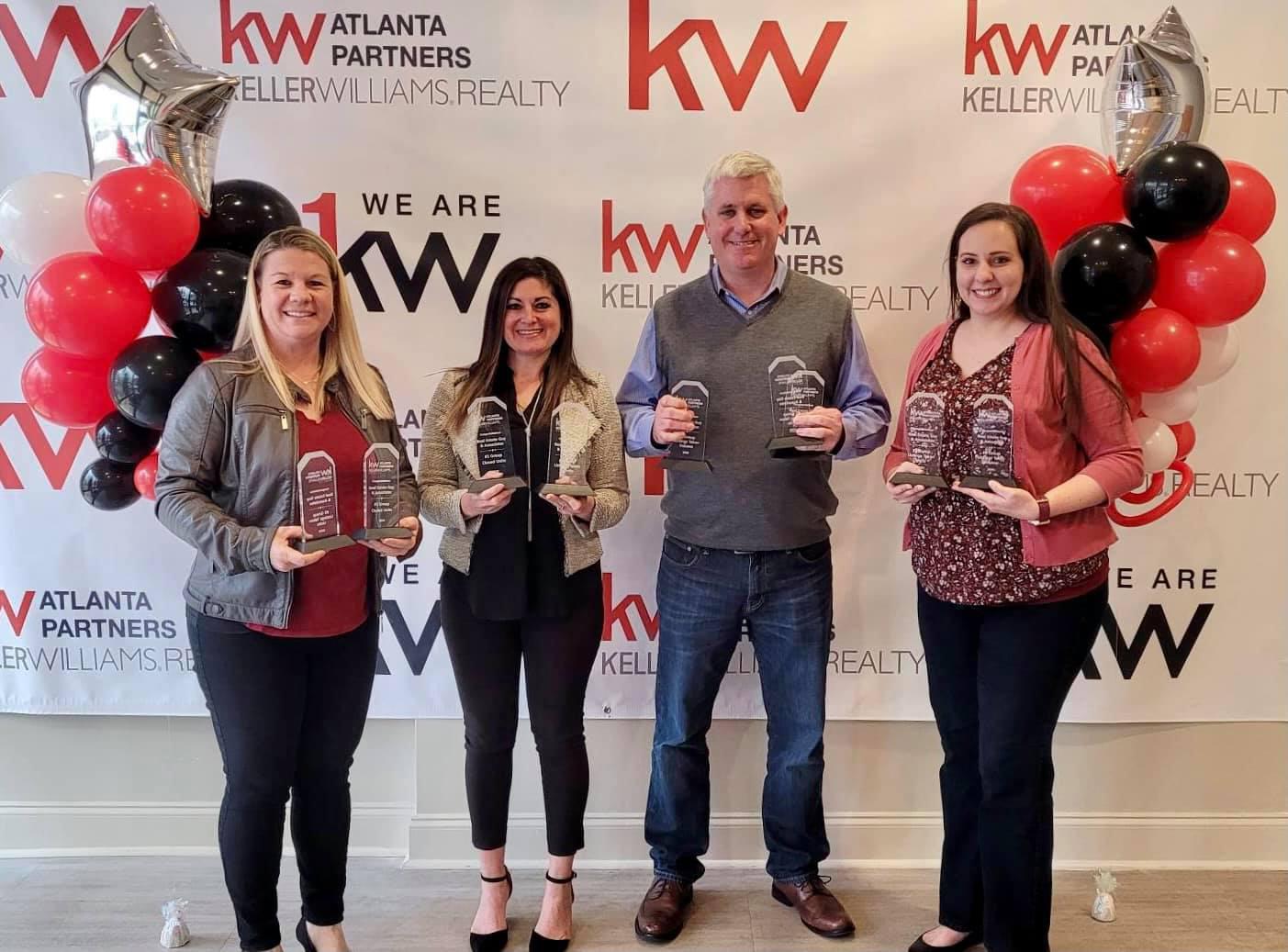 2020 Keller Williams Office Awards with team members from Left to Right: Melanie Redmond Mulholland, Vivian Rowland, Wade Lester, and Angela Reames