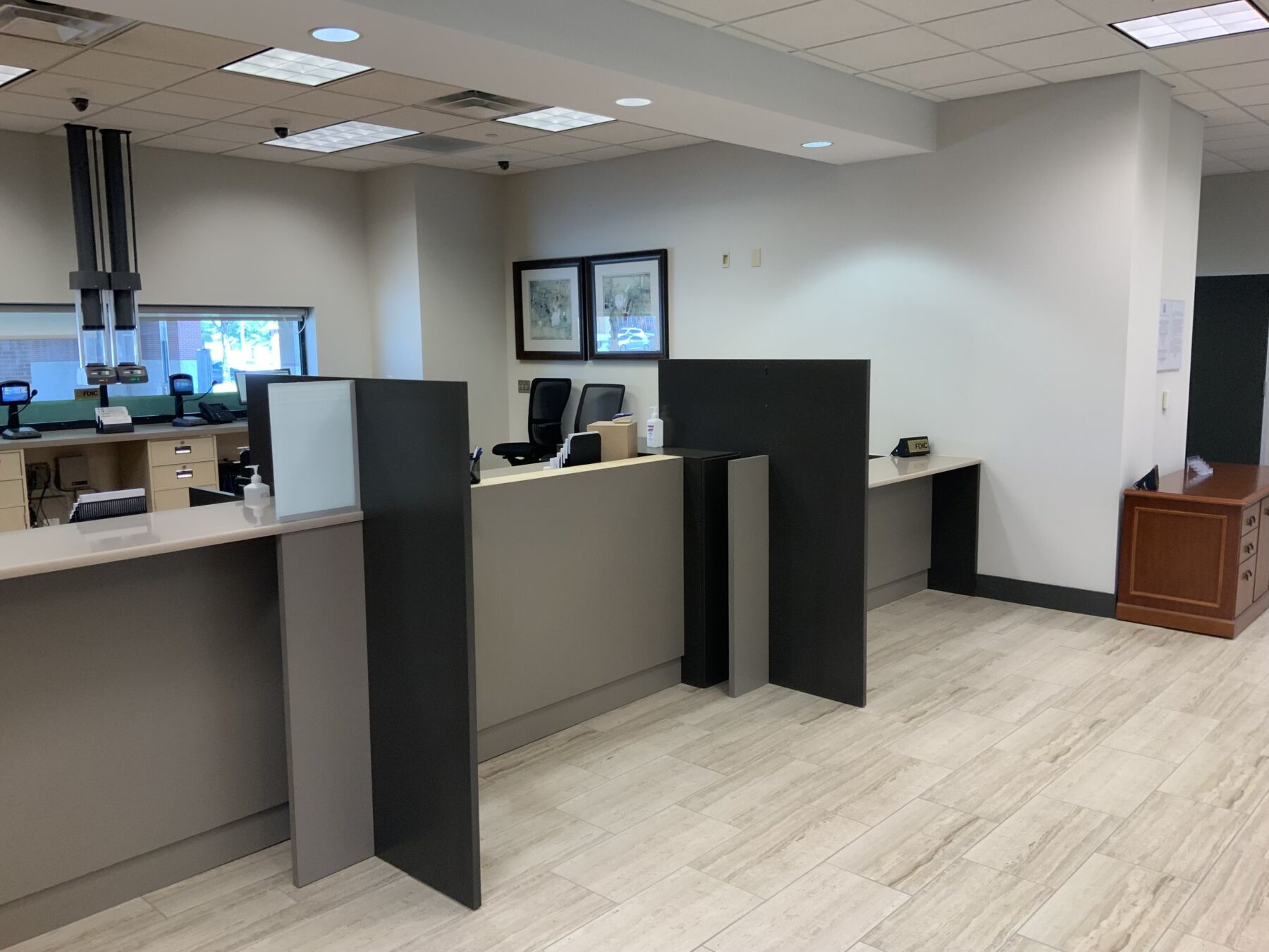 This professional bank reception area was meticulously cleaned by Dallas Janitorial Services, featuring sanitized teller counters and spotless partition screens. The space showcases our attention to detail in financial institutions where cleanliness conveys security and professionalism.