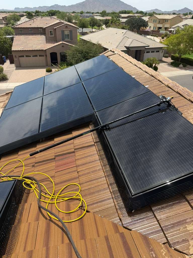 Professionally cleaned residential rooftop solar panels during a SunWorx Solar Services project in Gilbert, Arizona.