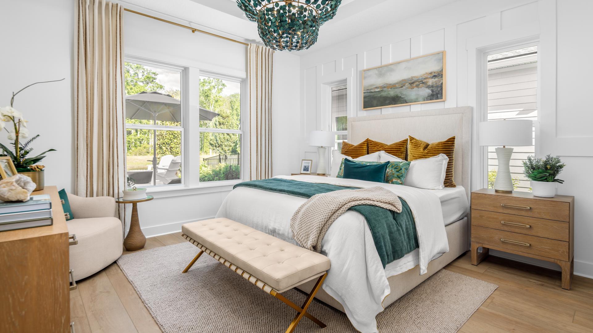 Elegant primary bedroom suites with tray ceilings and abundant natural light