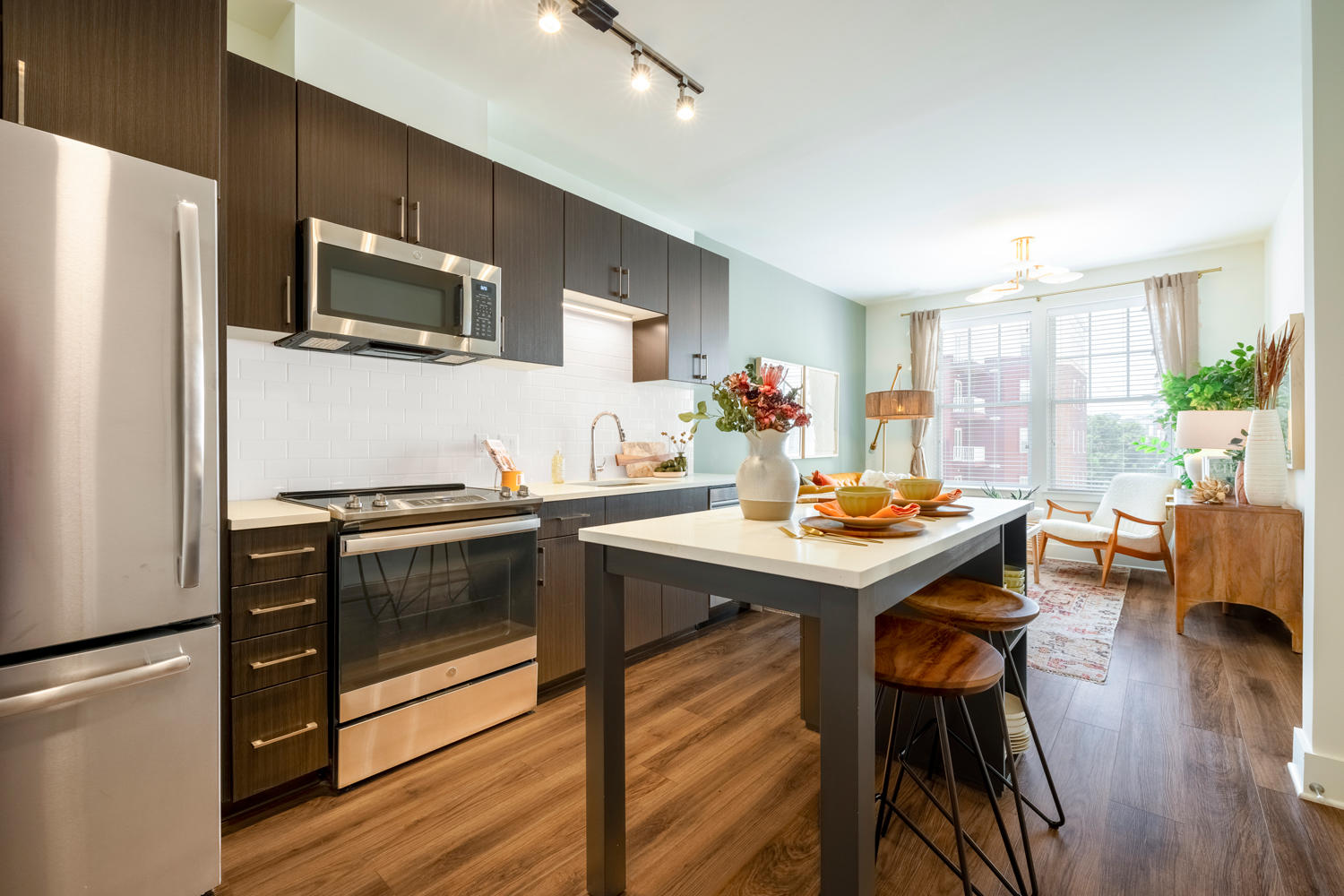 Designer wood-style flooring and energy-efficient stainless-steel appliances make your home vibrant.