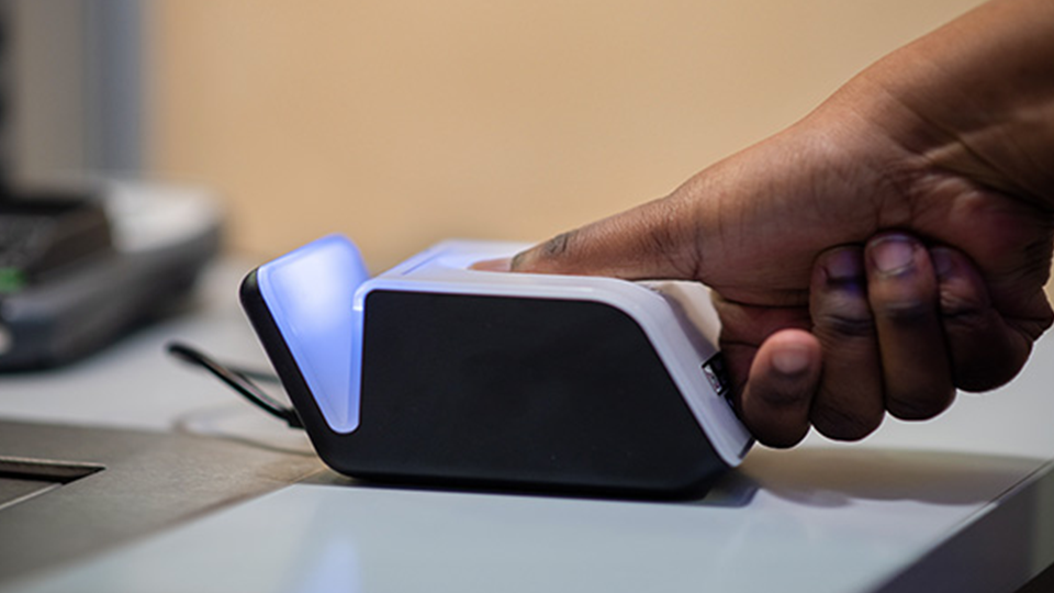 Person using a fingerprint scanner