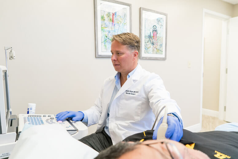 Dr. Christopher W. Boyes of Coastal Vein and Vascular Specialists with a Patient