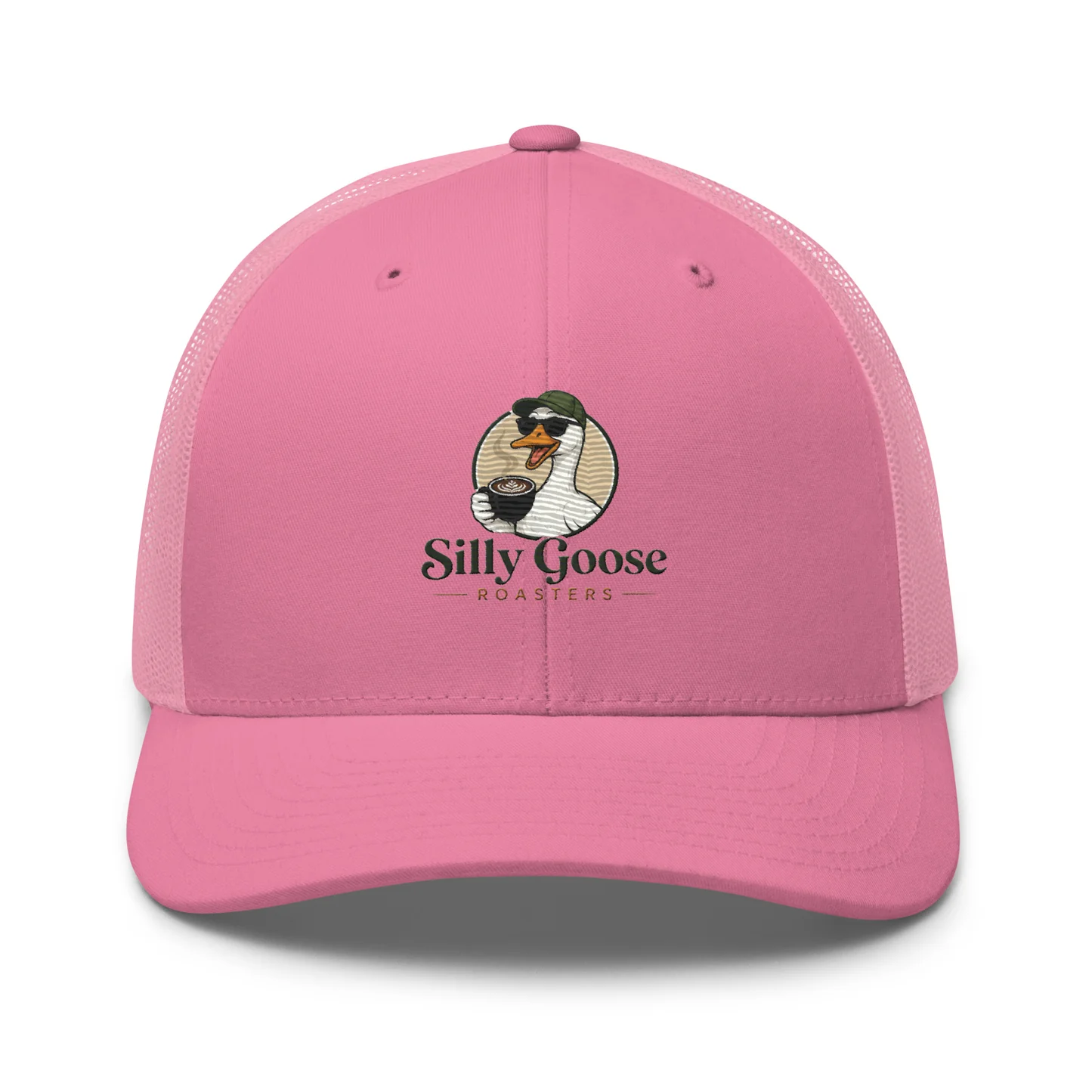 A pink trucker hat with a mesh back is displayed on a white background. The front of the hat features a circular logo with a cartoon goose wearing sunglasses and a green hat, holding a cup of coffee. Below the goose logo, the text "Silly Goose Roasters" is printed in a dark color.