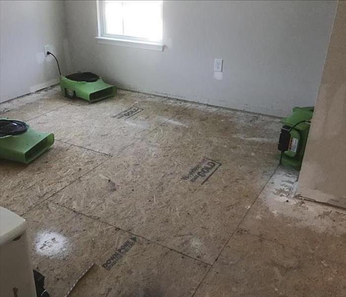 Water causes damage to flooring in this Wilbon home