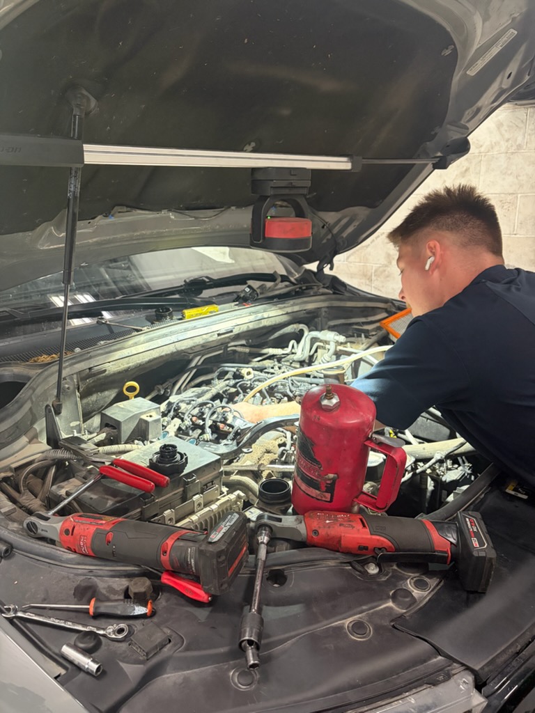 Engine repair being performed at Walker Tire Point S, 4221 S. 48th Street in Lincoln, Nebraska.
